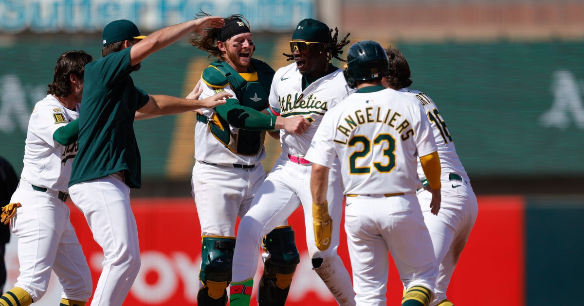 A's beat Red Sox 5-4, end Chapman's hitless streak of 50 batters, 17 appearances