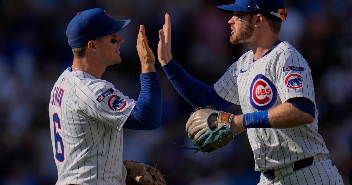 Cubs clinch the top NL wild card after 7-3 win against Cardinals at Wrigley Field