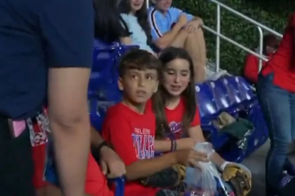 The crowd cheered as the boy received a special gift pack. Phillies Tailgate, /X