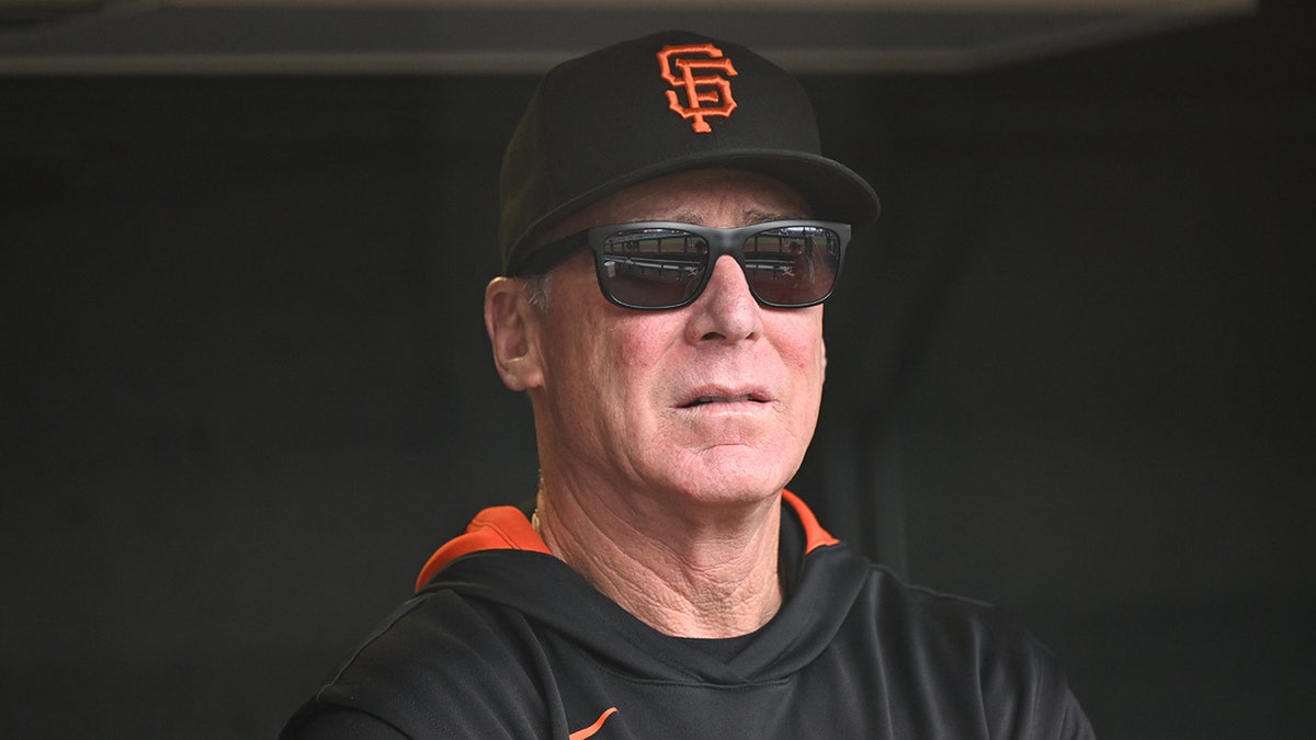 Bob Melvin looks on field