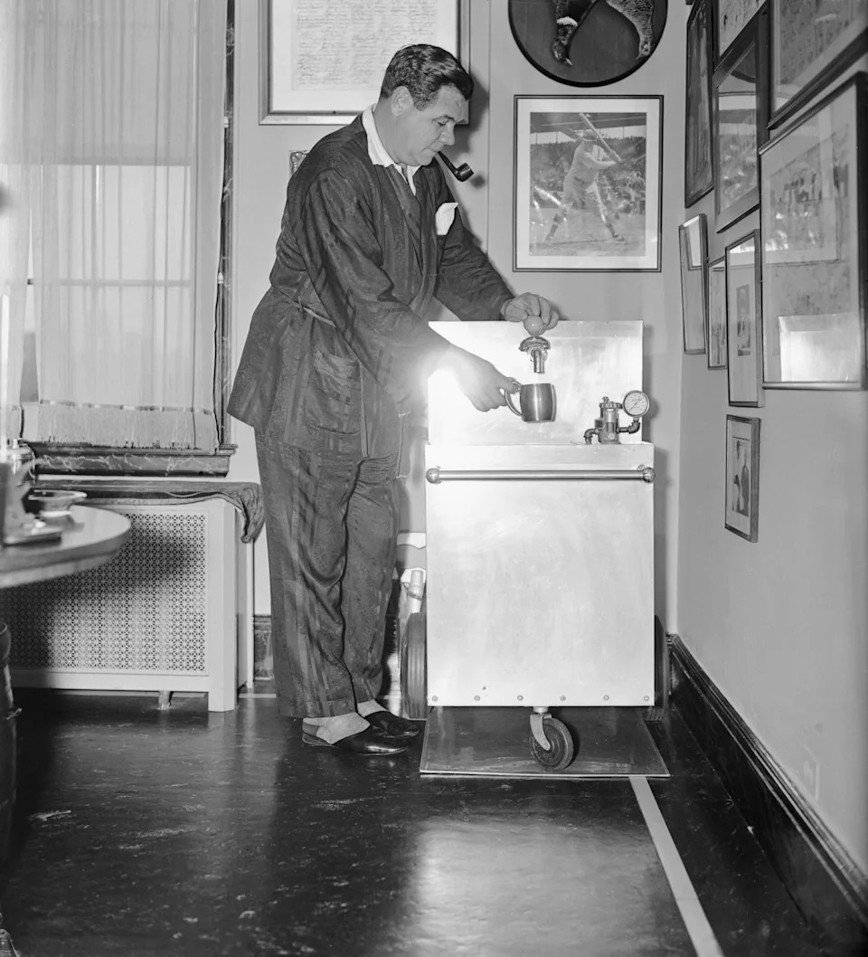 Babe Ruth pours a beer in his New York City apartment, circa 1935. (Bettmann Archives/Getty Images)