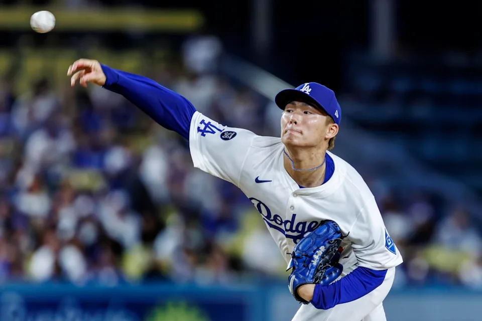Dodgers pitcher Yoshinobu Yamamoto delivers during the third inning against the Giants on Thursday.