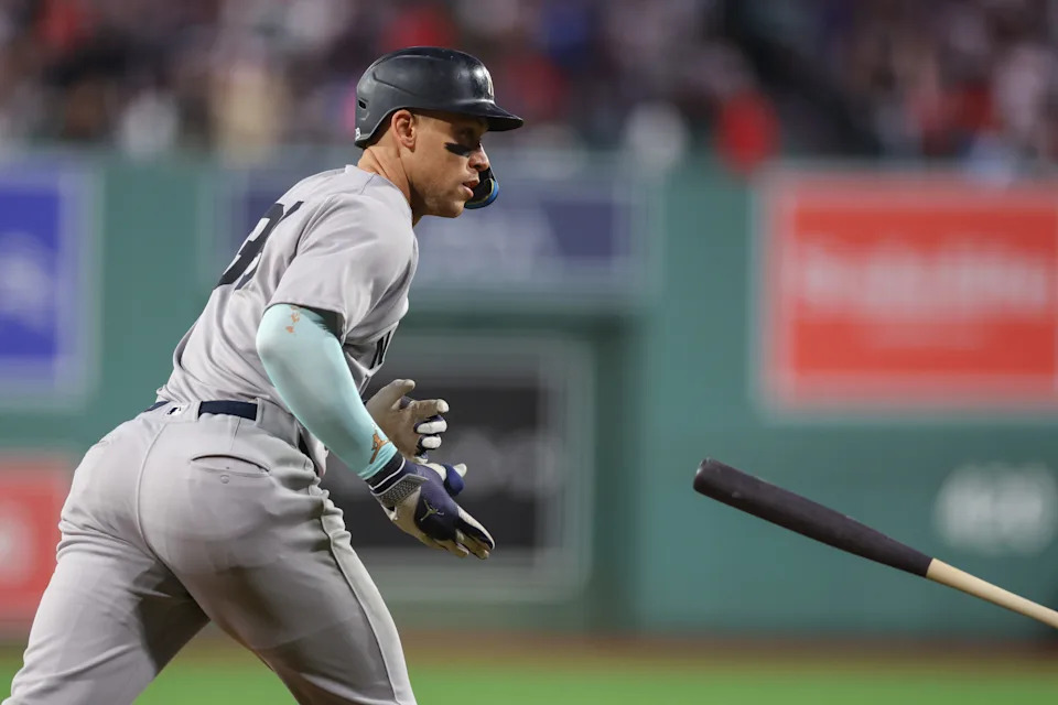 Sep 12, 2025; Boston, Massachusetts, USA; New York Yankees designated hitter Aaron Judge (99) reacts after hitting a home run during the first inning against the Boston Red Sox at Fenway Park. Mandatory Credit: Paul Rutherford-Imagn Images
