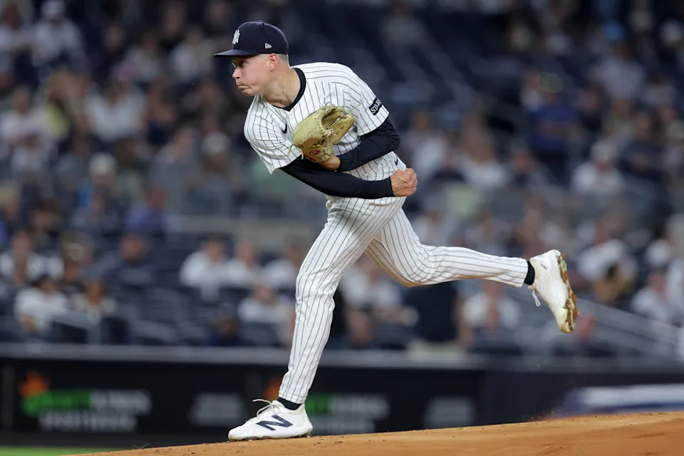 Sep 26, 2025; Bronx, New York, USA; New York Yankees starting pitcher Will Warren (98) follows through on a pitch against the Baltimore Orioles during the first inning at Yankee Stadium. Mandatory Credit: Brad Penner-Imagn Images