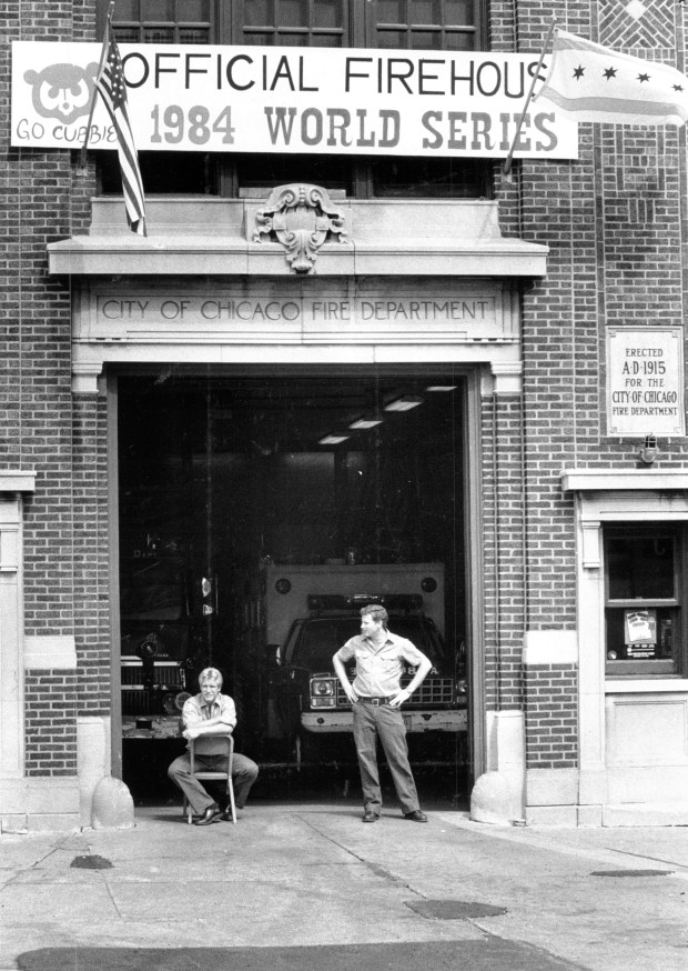 The view might not be the best, but the crowd noise can't be beat at Engine Co. 78 across Waveland Avenue from the friendly confines of Wrigley Field. Proving that even firefighters can get swept up in the Cubs season, the firehouse sported a new banner over its door in September 1984. (Carl Hugare/Chicago Tribune)