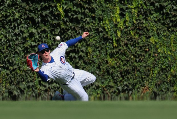 Cubs center fielder Pete Crow-Armstrong pivots to catch a ball hit Braves center fielder Michael Harris II for an out in the first inning at Wrigley Field on Sept. 1, 2025, in Chicago. (John J. Kim/Chicago Tribune)