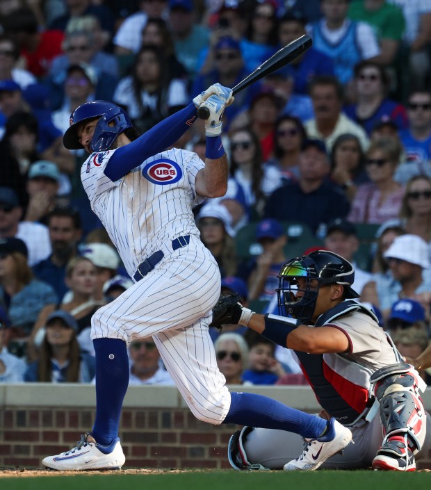 Cubs shortstop Dansby Swanson swings through on a two-run double against the Braves in the sixth inning at Wrigley Field on Sept. 1, 2025, in Chicago. (John J. Kim/Chicago Tribune)