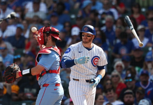 Cubs left fielder Ian Happ tosses his bat after striking out against the Cardinals in the third inning at Wrigley Field on Sept. 27, 2025, in Chicago. (John J. Kim/Chicago Tribune)