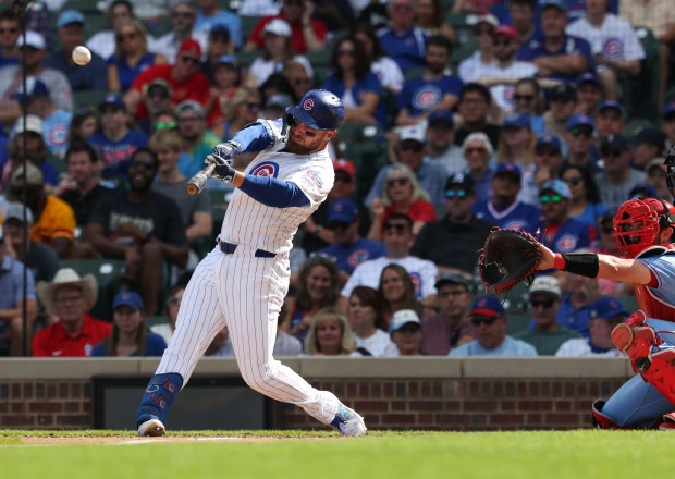 Cubs first baseman Michael Busch connects for a two-run home run against the Cardinals in the fifth inning at Wrigley Field on Sept. 27, 2025, in Chicago. (John J. Kim/Chicago Tribune)