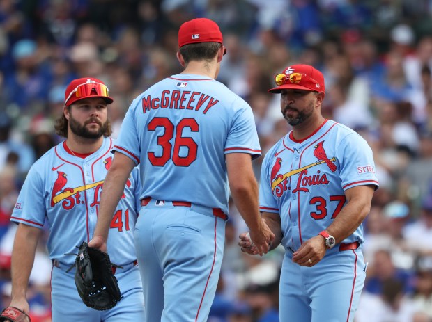 Cardinals manager Oliver Marmol takes starting pitcher Michael McGreevy out of the game in the fifth inning against the Cubs at Wrigley Field on Sept. 27, 2025, in Chicago. (John J. Kim/Chicago Tribune)
