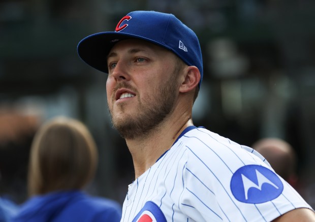 Cubs starting pitcher Jameson Taillon watches the video replay of a solo home run hit by right fielder Seiya Suzuki in the sixth inning against the Cardinals at Wrigley Field on Sept. 27, 2025, in Chicago. (John J. Kim/Chicago Tribune)