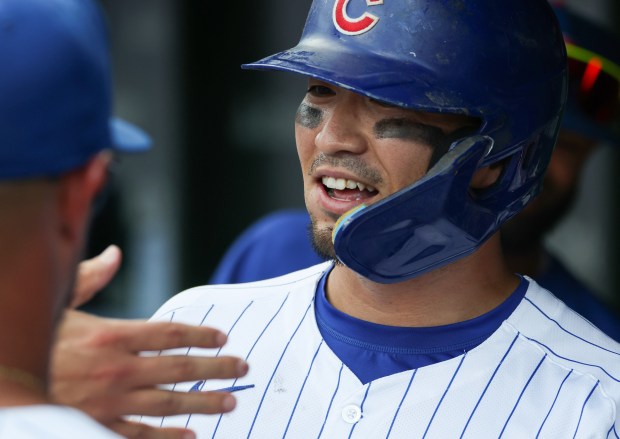 Cubs right fielder Seiya Suzuki is congratulated after hitting a solo home run in the sixth inning against the Cardinals at Wrigley Field on Sept. 27, 2025, in Chicago. (John J. Kim/Chicago Tribune)