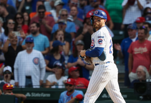 Cubs first baseman Michael Busch looks toward the mound after being intentionally walked in the eighth inning against the Cardinals at Wrigley Field on Sept. 27, 2025, in Chicago. The intentional walk denied him a chance to hit for the cycle, needing a single. (John J. Kim/Chicago Tribune)