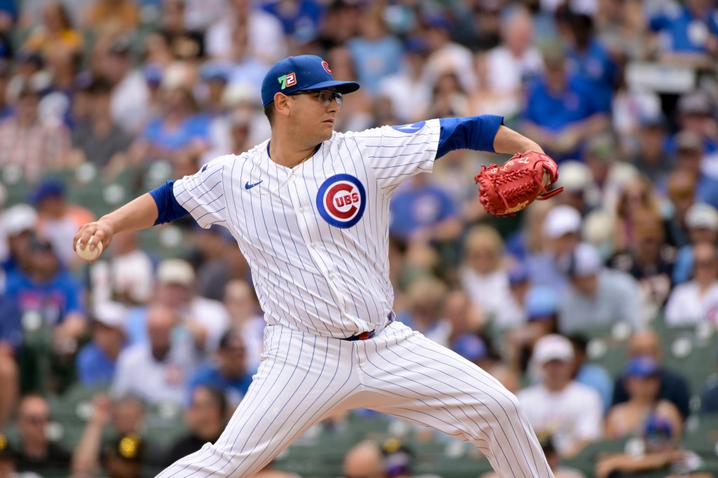 Javier Assad pitching for the Cubs.