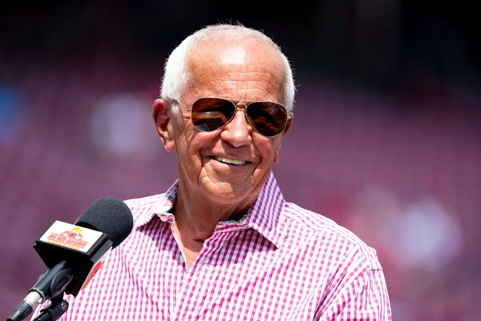 Marty Brennaman smiles while speaking during a ceremony honoring the “Big Red Machine” team before the game between Cincinnati Reds and San Diego Padres at Great American Ball Park in Cincinnati on Saturday, June 28, 2025.
