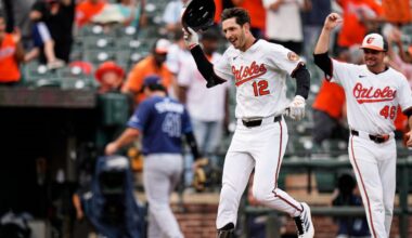 Baltimore Orioles' Dylan Beavers (12) celebrates after hitting a walk-off home run in the ninth inning of a baseball game against the Tampa Bay Rays, Thursday, Sept. 25, 2025, in Baltimore. (AP Photo/Stephanie Scarbrough)