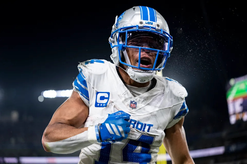 Amon-Ra St. Brown celebrates a touchdown. (Michael Owens/Getty Images)