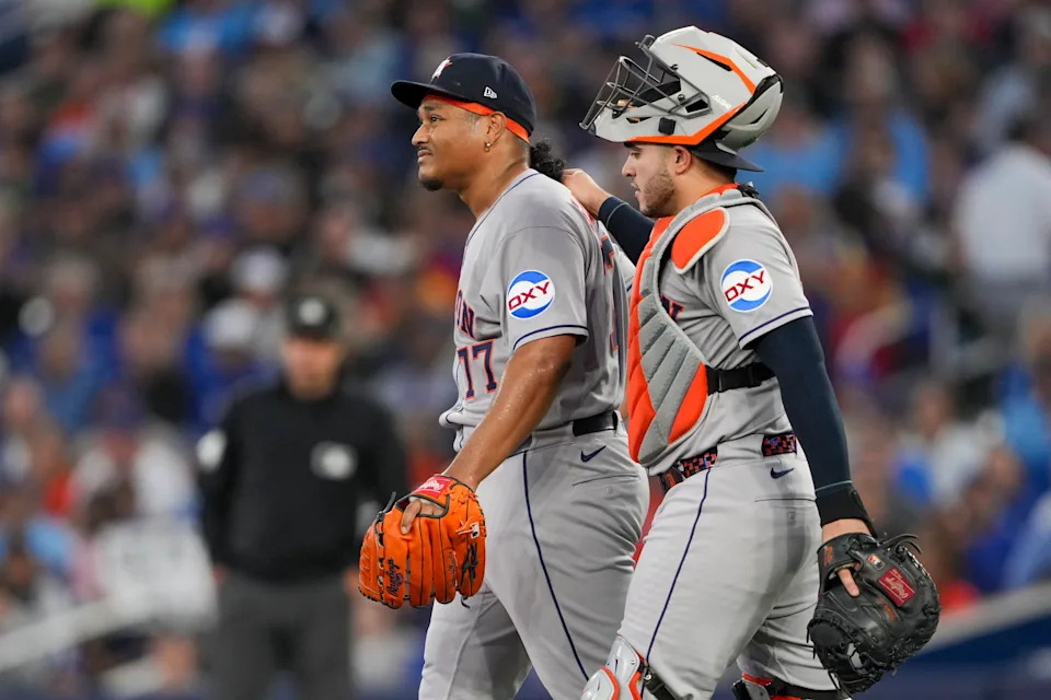 Luis Garcia, left, appeared to immediately realize that something was wrong after throwing a pitch in the second inning. 