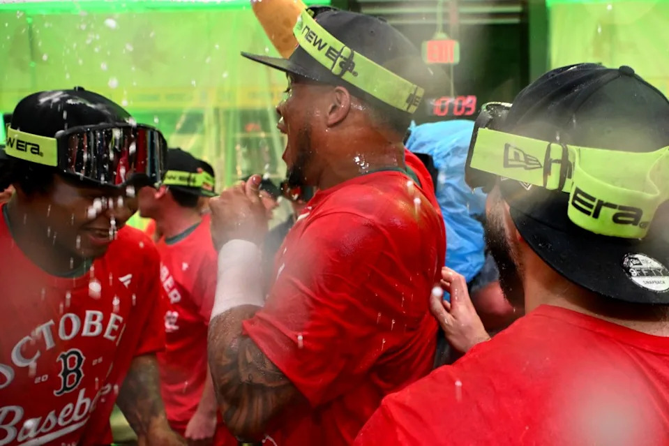 Ceddanne Rafaela of the Boston Red Sox celebrates in the clubhouse after hitting a walk-off RBI triple against the Detroit Tigers during the ninth inning to clinch a spot in the playoffs at Fenway Park on September 26, 2025 in Boston, Massachusetts. Getty Images