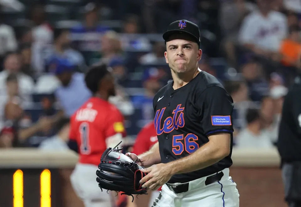 Ryan Helsley of the New York Mets reacts after the go-ahead run scores on a double by Ozzie Albies of the Atlanta Braves during the eighth inning. Charles Wenzelberg/New York Post
