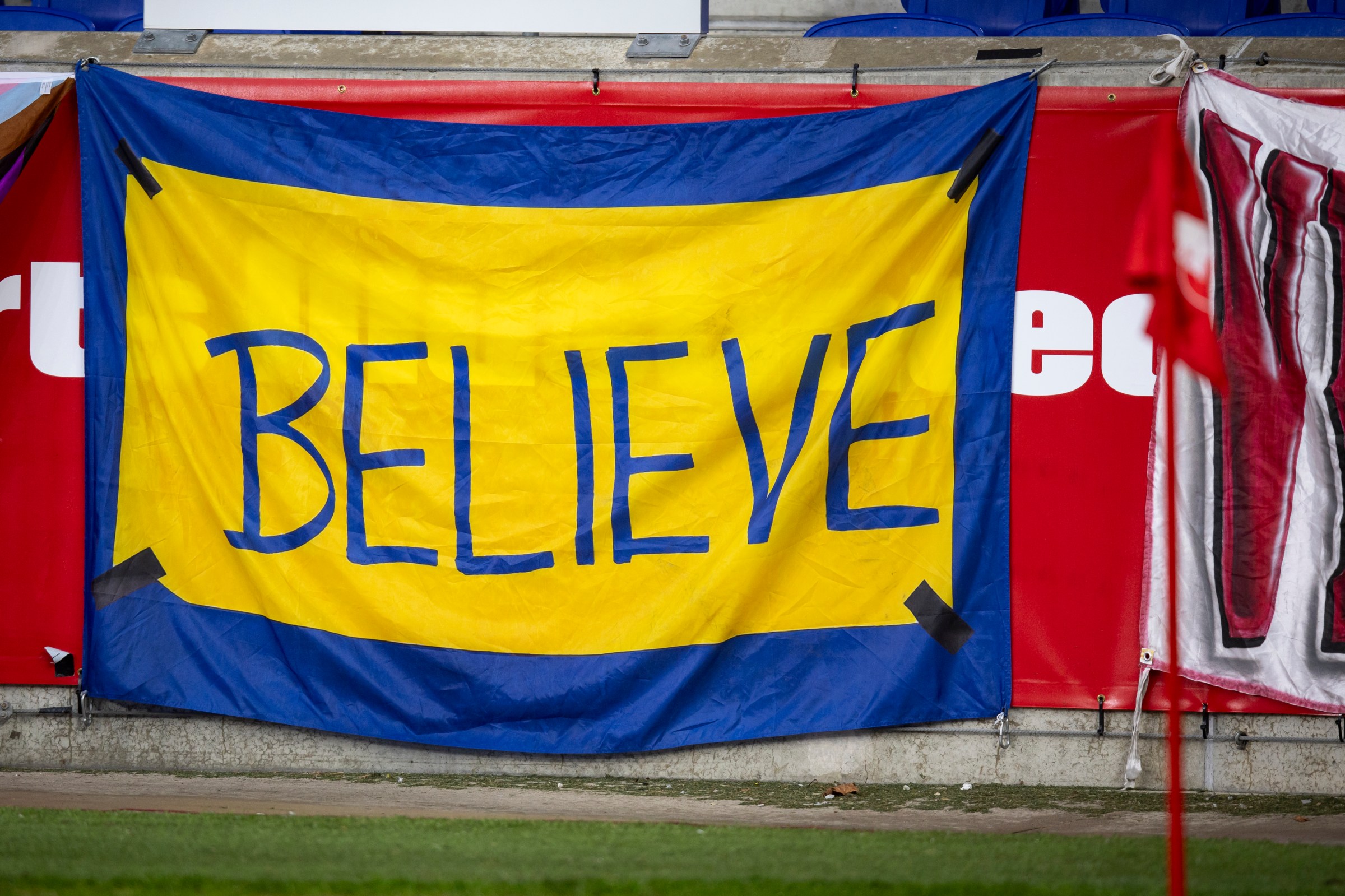 HARRISON, NEW JERSEY - APRIL 05: A “BELIEVE” sign similar to that from the “Ted Lasso” show is displayed on the pitch before the start of the Major League Soccer match between Chicago Fire FC and New York Red Bulls at Sports Illustrated Stadium on April 05, 2025 in Harrison, New Jersey. (Photo by Ira L. Black - Corbis/Getty Images)..