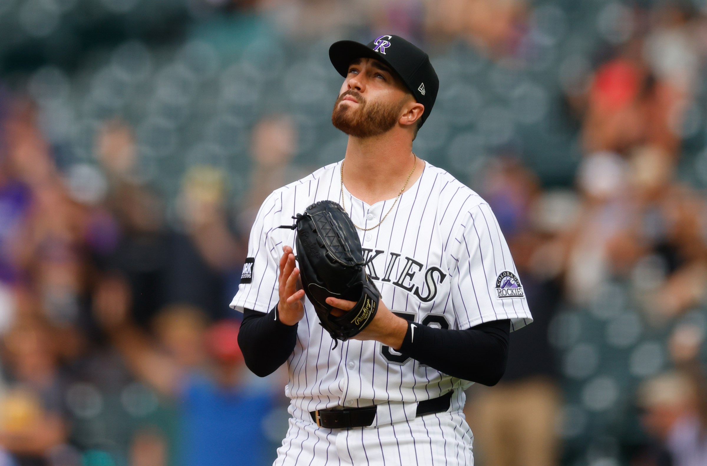 DENVER, CO - AUGUST 2: Dugan Darnell #52 of the Colorado Rockies reacts after securing the 8-5 win against the Pittsburgh Pirates at Coors Field on August 2, 2025 in Denver, Colorado. (Photo by Justin Edmonds/Getty Images)