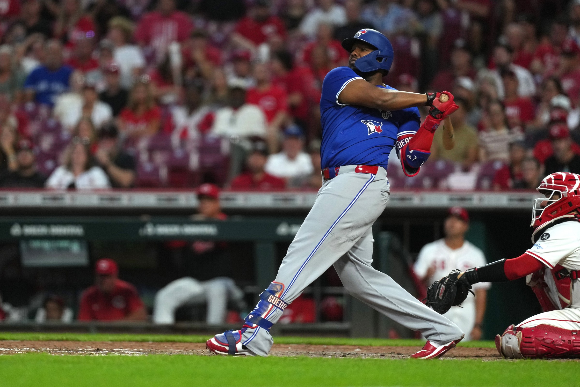 CINCINNATI, OHIO - SEPTEMBER 03: Vladimir Guerrero Jr. #27 of the Toronto Blue Jays hits a solo home run during the fifth inning against the Cincinnati Reds at Great American Ball Park on September 03, 2025 in Cincinnati, Ohio. (Photo by Jason Mowry/Getty Images)