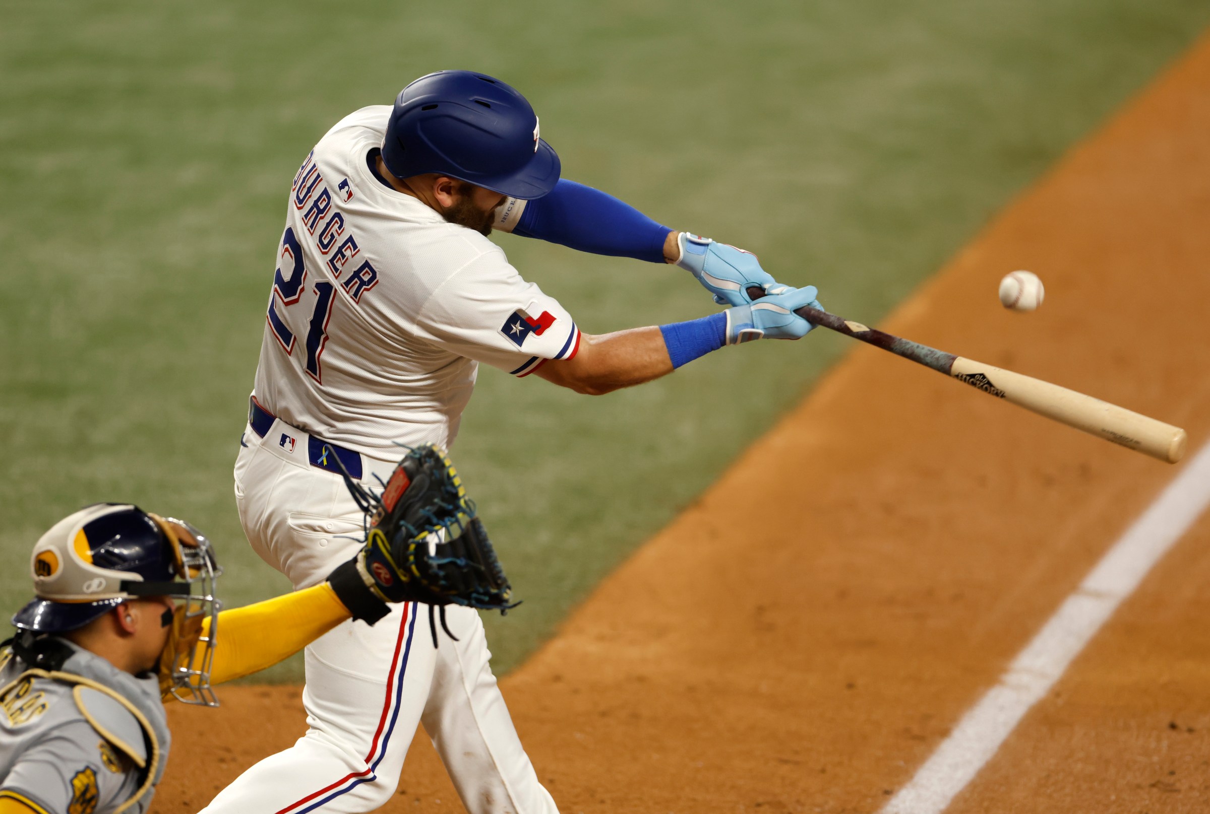 ARLINGTON, TX - SEPTEMBER 9: Jake Burger #21 of the Texas Rangers bats against the Milwaukee Brewers during the game at Globe Life Field on September 9, 2025 in Arlington, Texas. (Photo by Ron Jenkins/Getty Images)