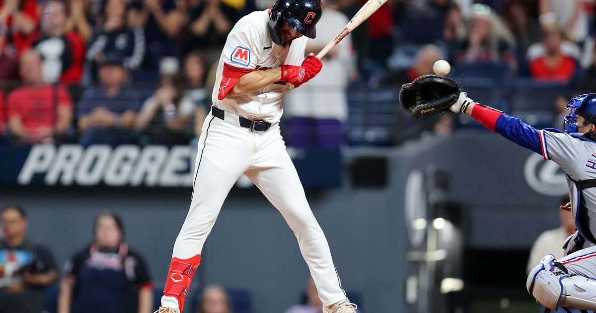Guardians clinch playoff spot on walk-off hit-by-pitch against Rangers, eliminate Astros from postseason