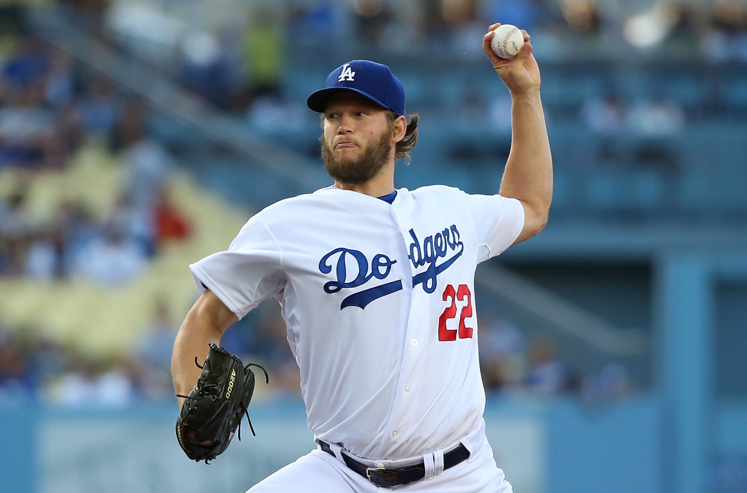 LOS ANGELES, CA - JUNE 18: Pitcher Clayton Kershaw #22 of the Los Angeles Dodgers pitches in the first inning during the MLB game against the Colorado Rockies at Dodger Stadium on June 18, 2014 in Los Angeles, California. (Photo by Victor Decolongon/Getty Images)