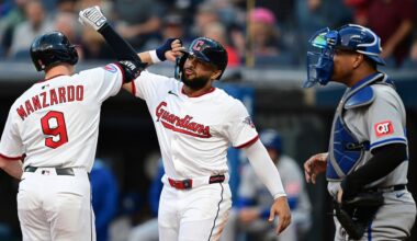 Cleveland Guardians' Kyle Manzardo (9) is congratulated by George Valera, center, after hitting a two-run home run off Kansas City Royals pitcher Jonathan Bowlan during the first inning of a baseball game, Wednesday, Sept. 10, 2025, in Cleveland. (AP Photo/David Dermer)
