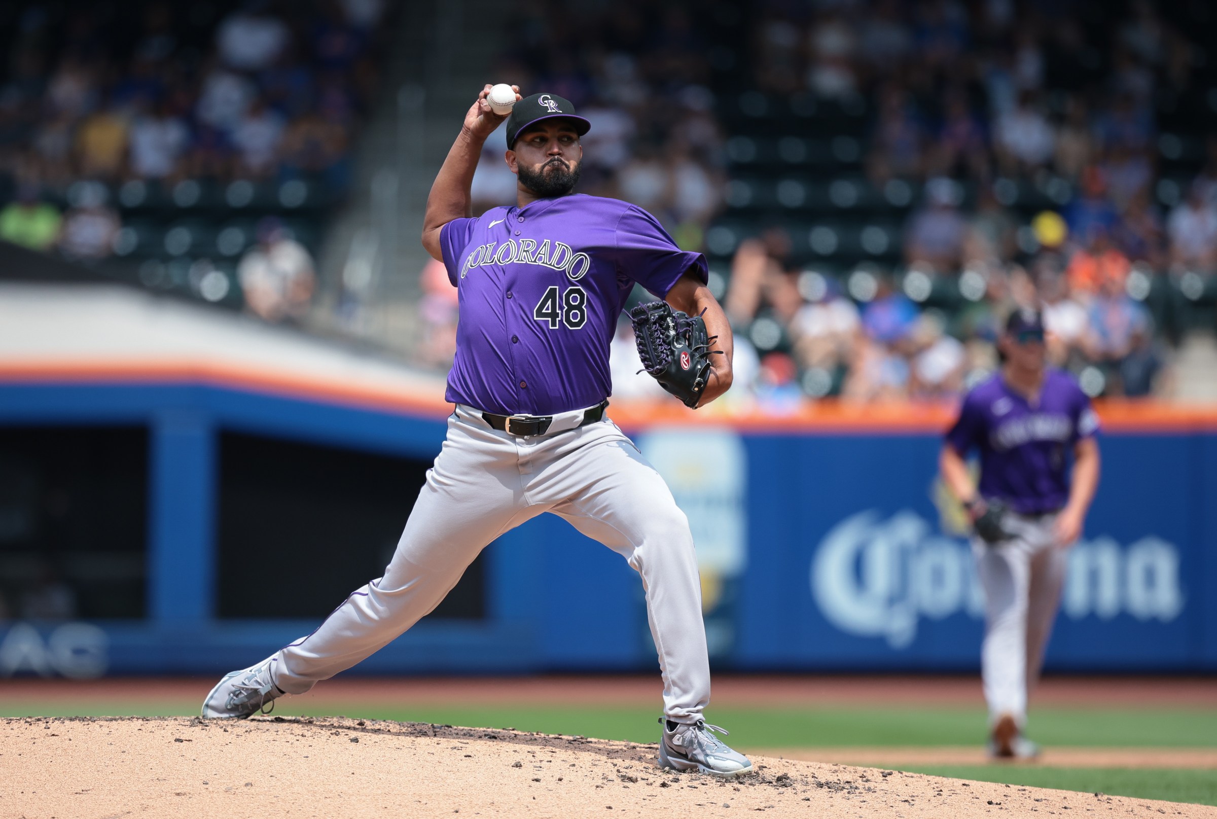 Jul 14, 2024; New York City, New York, USA; Colorado Rockies starting pitcher German Marquez (48) delivers a pitch during the third inning against the New York Mets at Citi Field. Mandatory Credit: Vincent Carchietta-Imagn Images