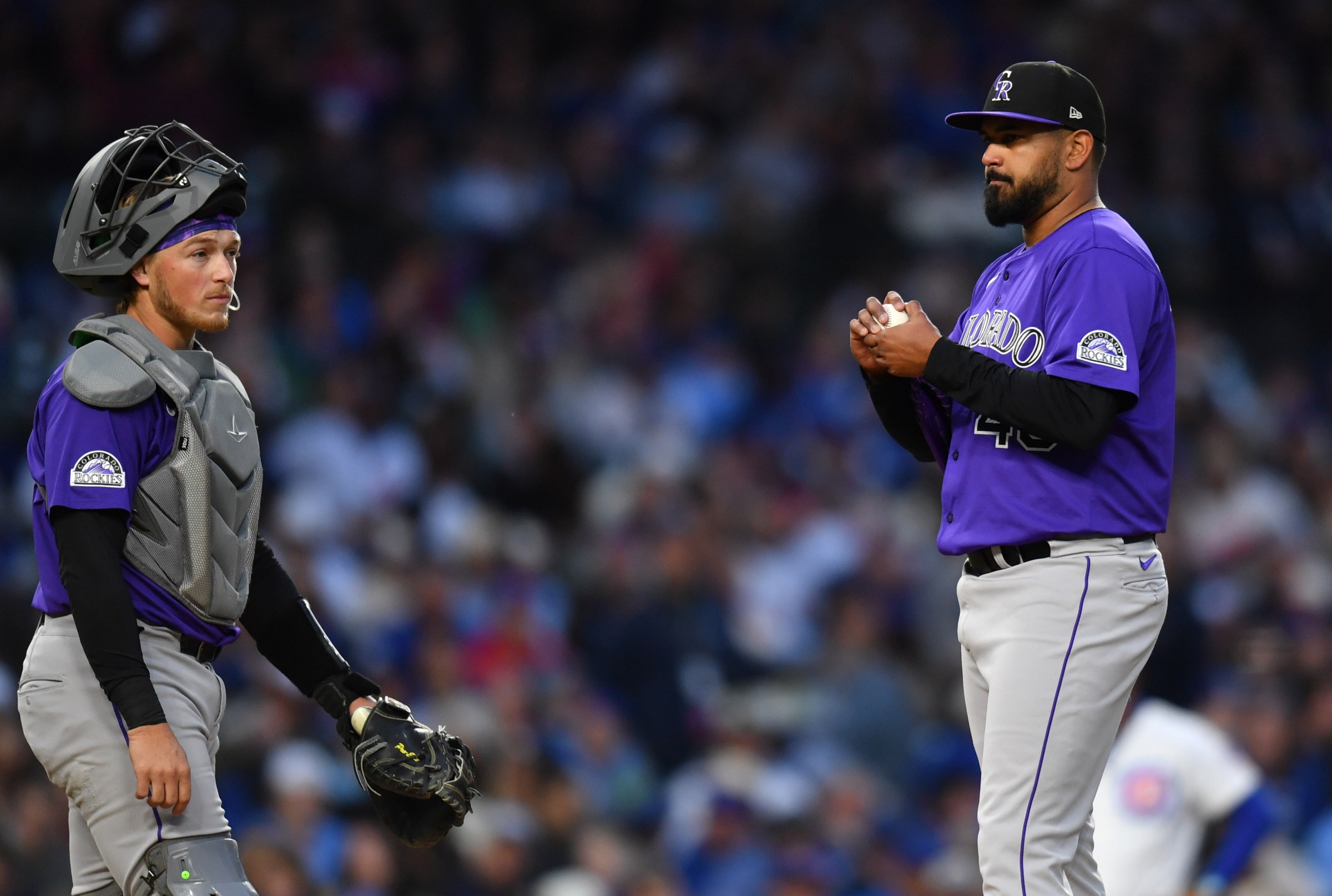 May 27, 2025; Chicago, Illinois, USA; Colorado Rockies starting pitcher German Marquez (48) reacts next to catcher Hunter Goodman (15) during a game against the Chicago Cubs at Wrigley Field. Mandatory Credit: Patrick Gorski-Imagn Images