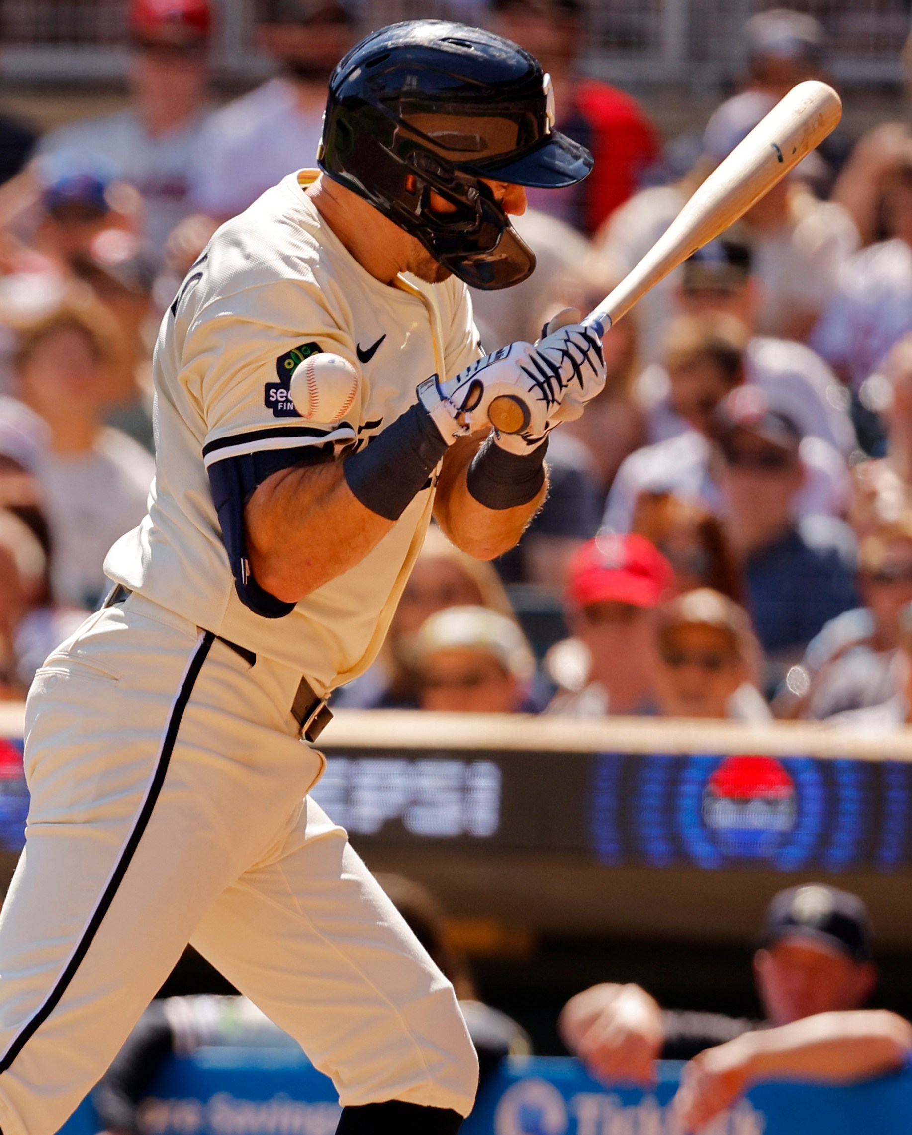 Aug 31, 2025; Minneapolis, Minnesota, USA; Minnesota Twins second baseman Kody Clemens (18) gets hit by a pitch by the San Diego Padres in the fifth inning at Target Field. Mandatory Credit: Bruce Kluckhohn-Imagn Images