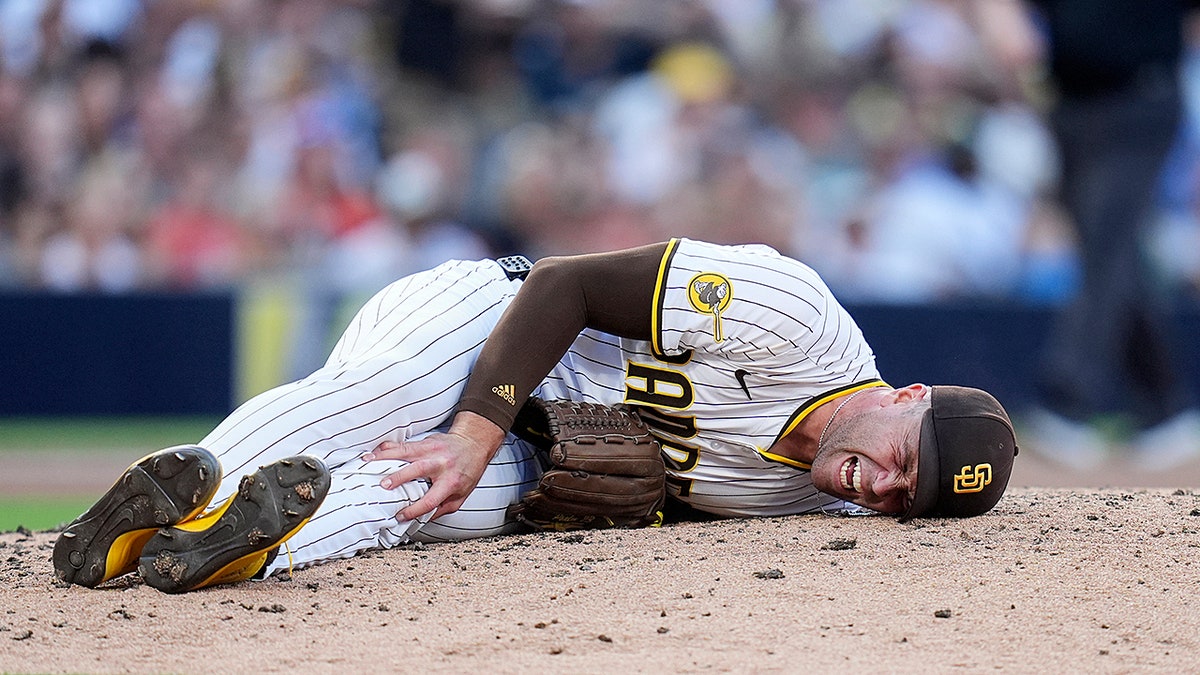 Jason Adam down in pain