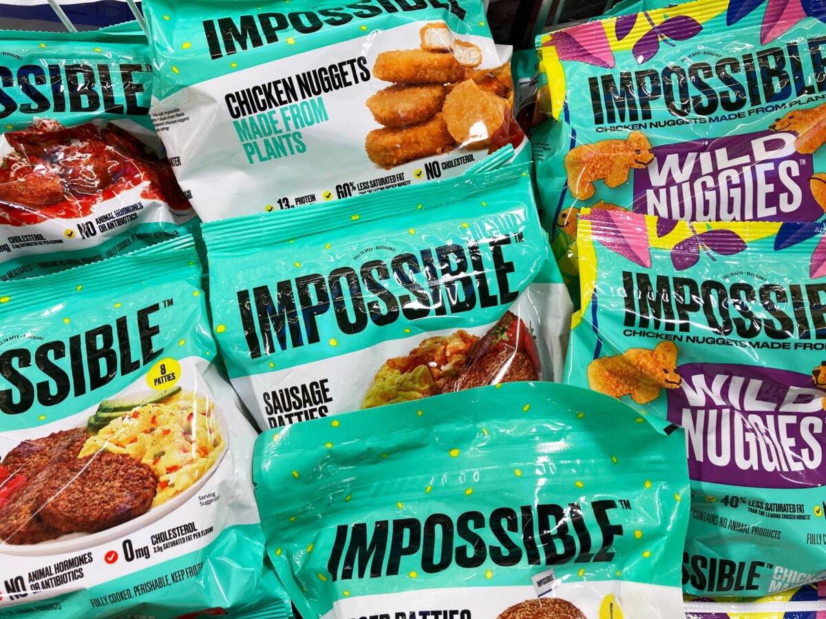 Photo shows a selection of Impossible Foods products, including Impossible "Chicken" Nuggets