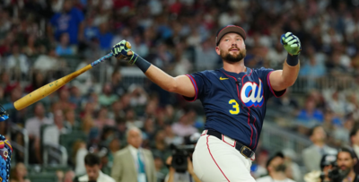 Cal Raleigh and Seattle Mariners protectively celebrate with champagne after a 9-2 win over Colorado Rockies