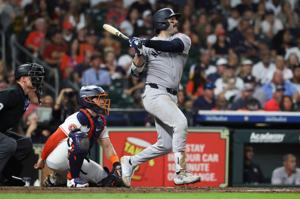 New York Yankees catcher Austin Wells hits a double.