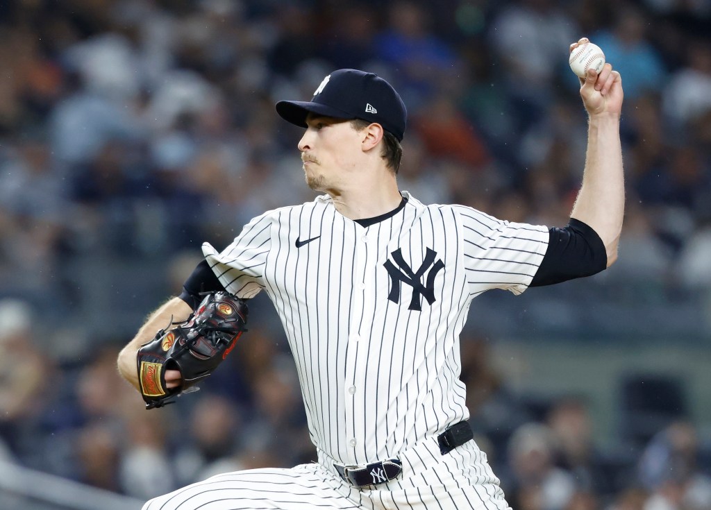 New York Yankees pitcher Max Fried pitching during a game.
