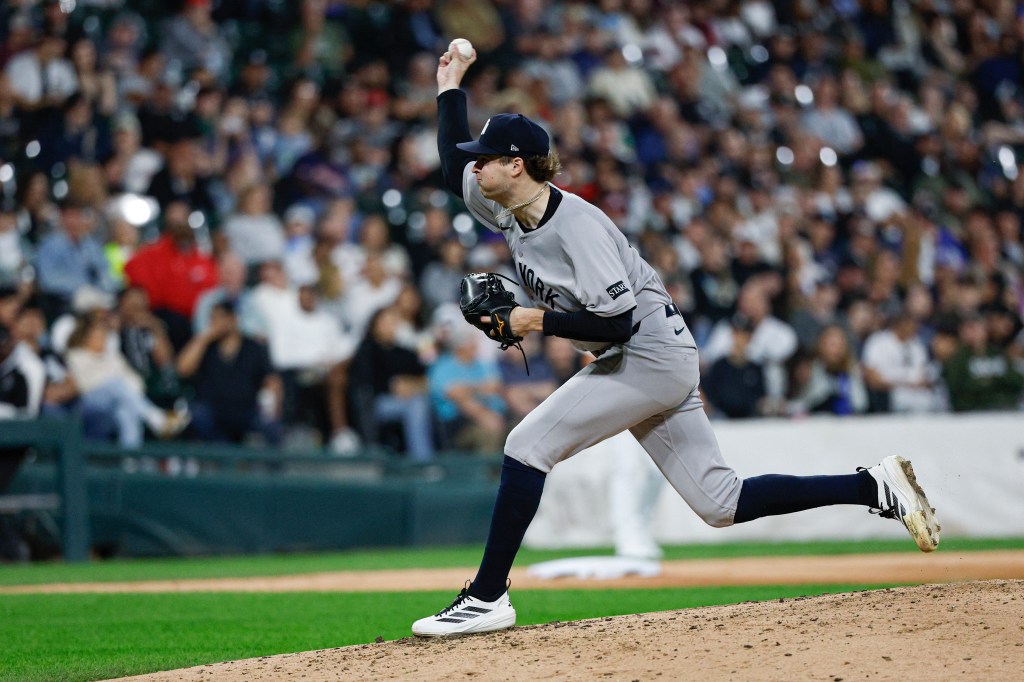 New York Yankees pitcher Cam Schlittler pitching a ball.