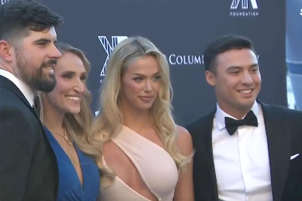 Anthony Volpe poses with stunning blonde at Yankees charity event