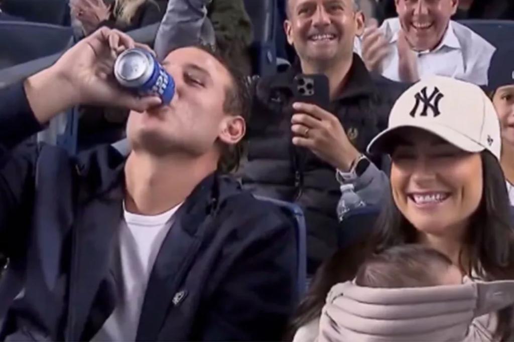 Anthony Rizzo chugs beer while taking in Yankees game with wife, baby