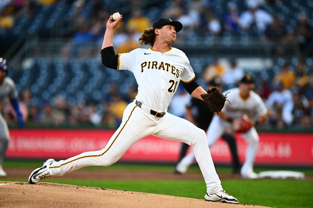 Pittsburgh Pirates pitcher throwing a baseball.