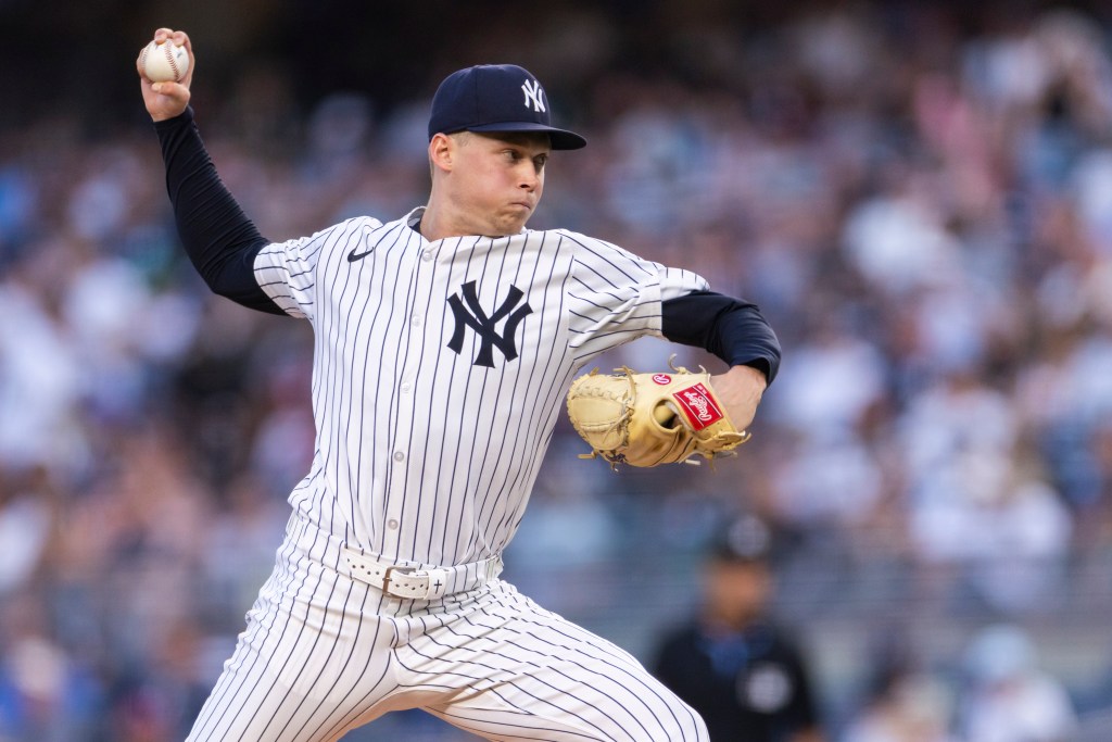 New York Yankees pitcher Will Warren throwing a baseball.