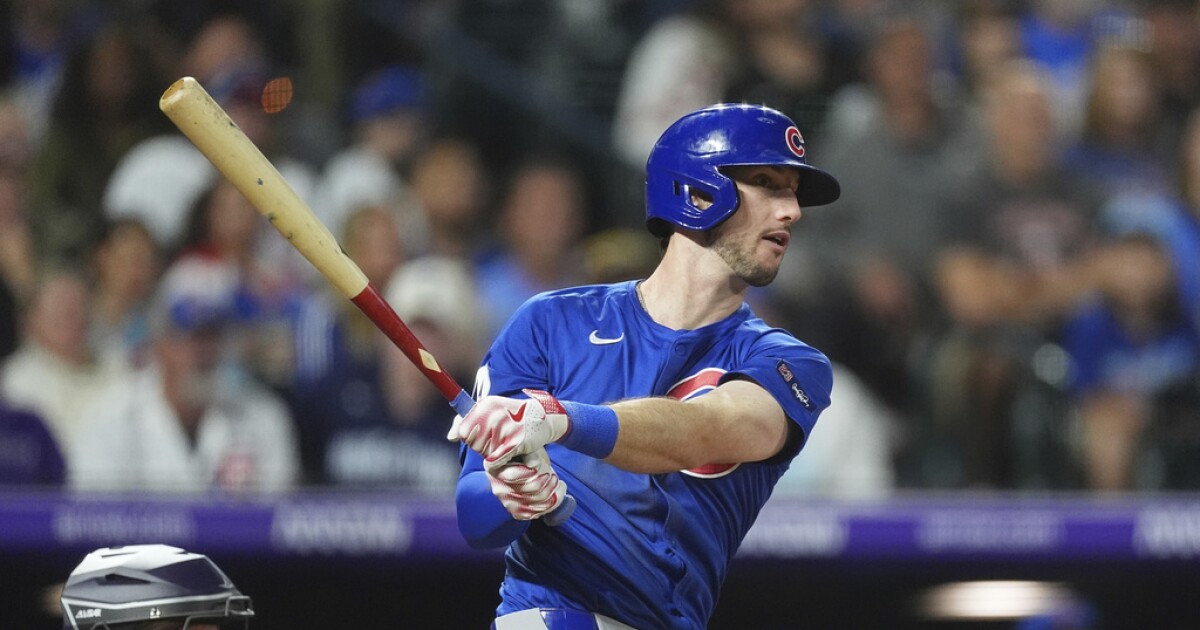 Tucker and Assad power Cubs to a 4-3 win over the Rockies on Saturday