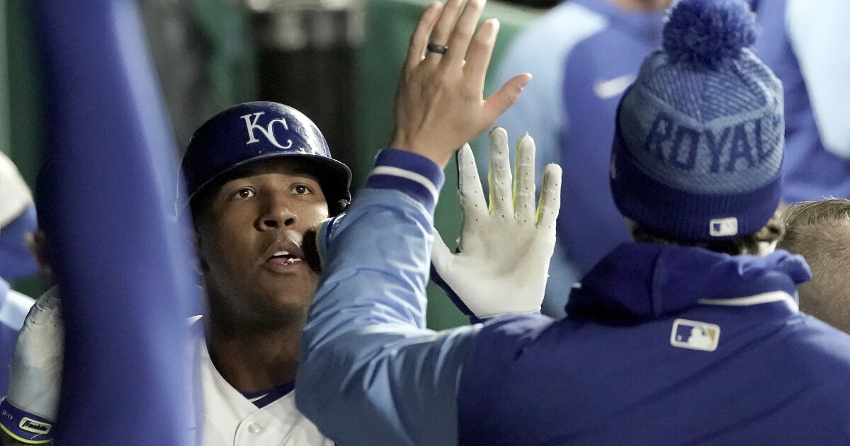 Royals break out the bats in rout of Cubs in Chicago, 12-4