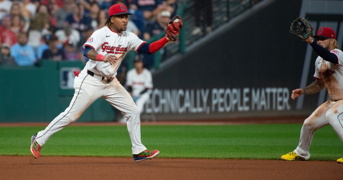 Guardians clinch playoff spot after walk-off hit by pitch win against Rangers