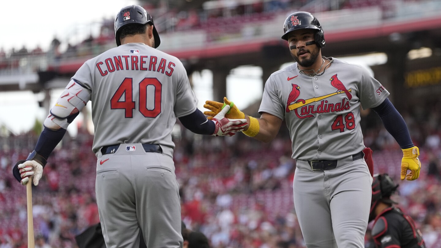 Winn drives in 3 runs, Cardinals take advantage of De La Cruz's error in 10th for 7-5 win over Reds