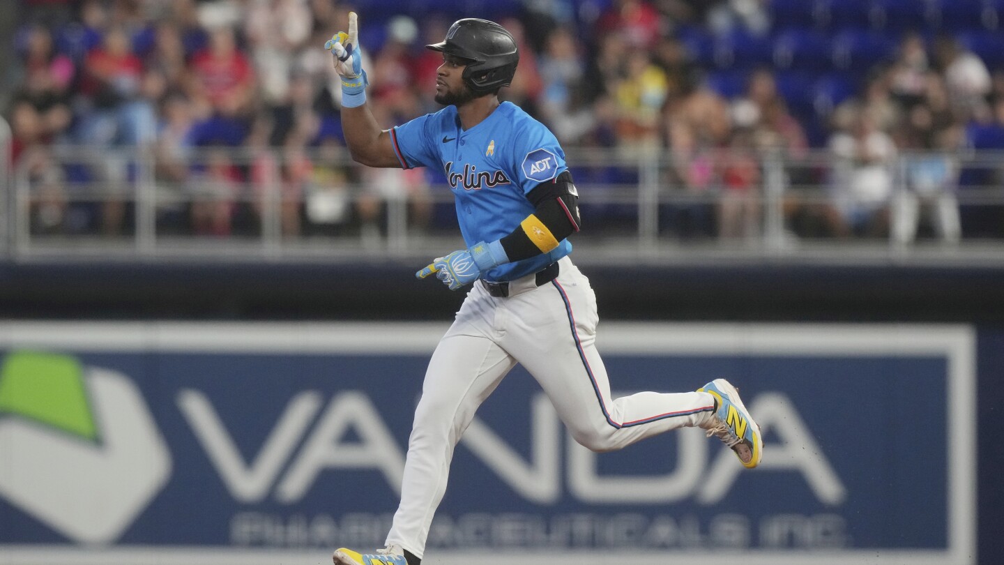 Otto López homers twice, Marlins beat Phillies 5-4 to avoid 3-game sweep