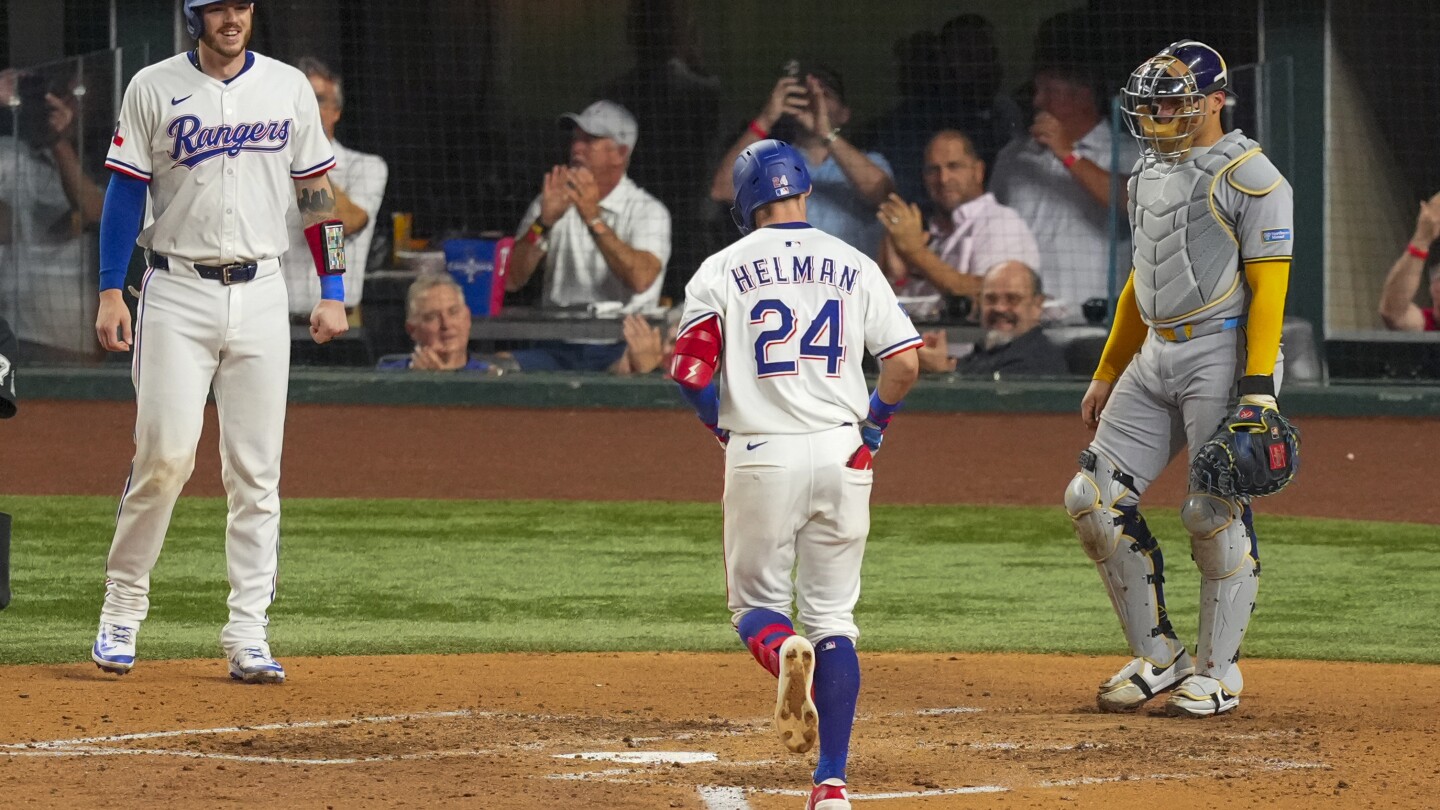Michael Helman hits 2-run HR, make catch to prevent 2-run HR, as Rangers beat Brewers 5-4